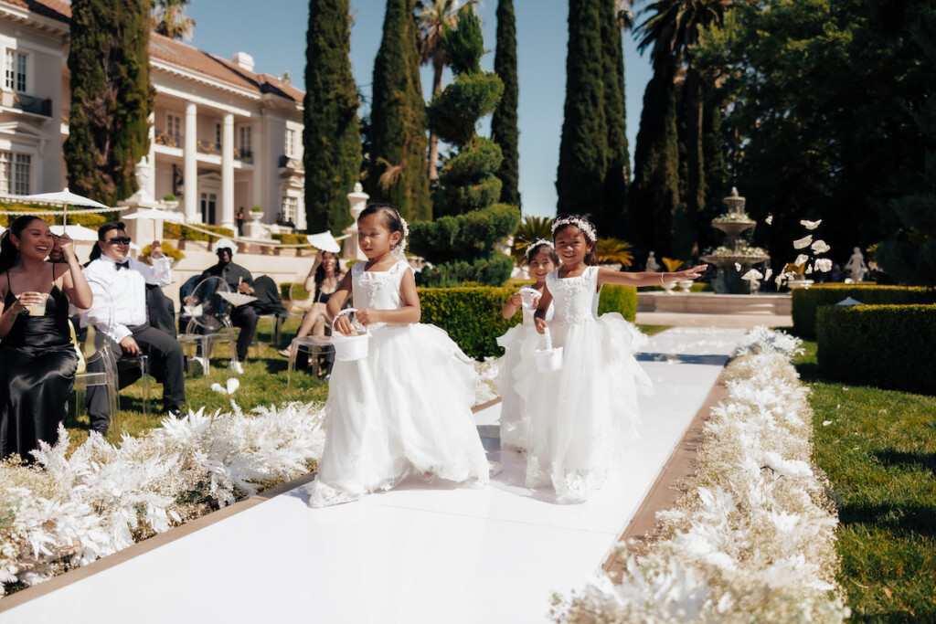 Featured in MunaLuchi Bride Magazine, Issue 31, Ray and Sidtia's two-day wedding in California celebrates Cambodian culture with gorgeous cultural attire, colorful floral designs, and a stunning all-white wedding.