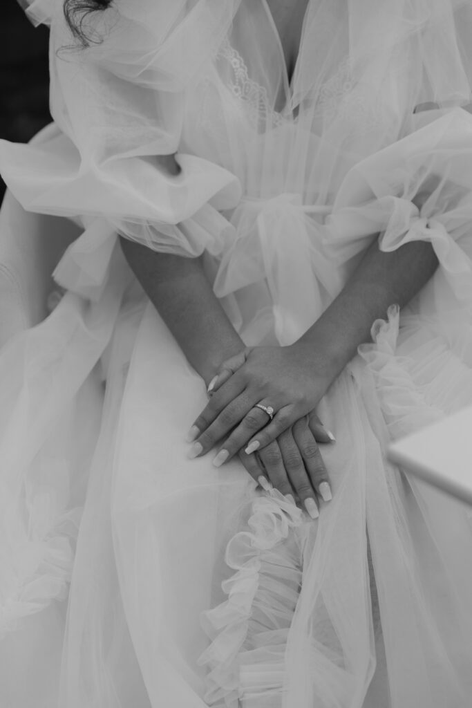 In this luxe ballroom wedding, fairytale details caught our eyes with romantic roses, tiaras, candles, and sparkly gowns.