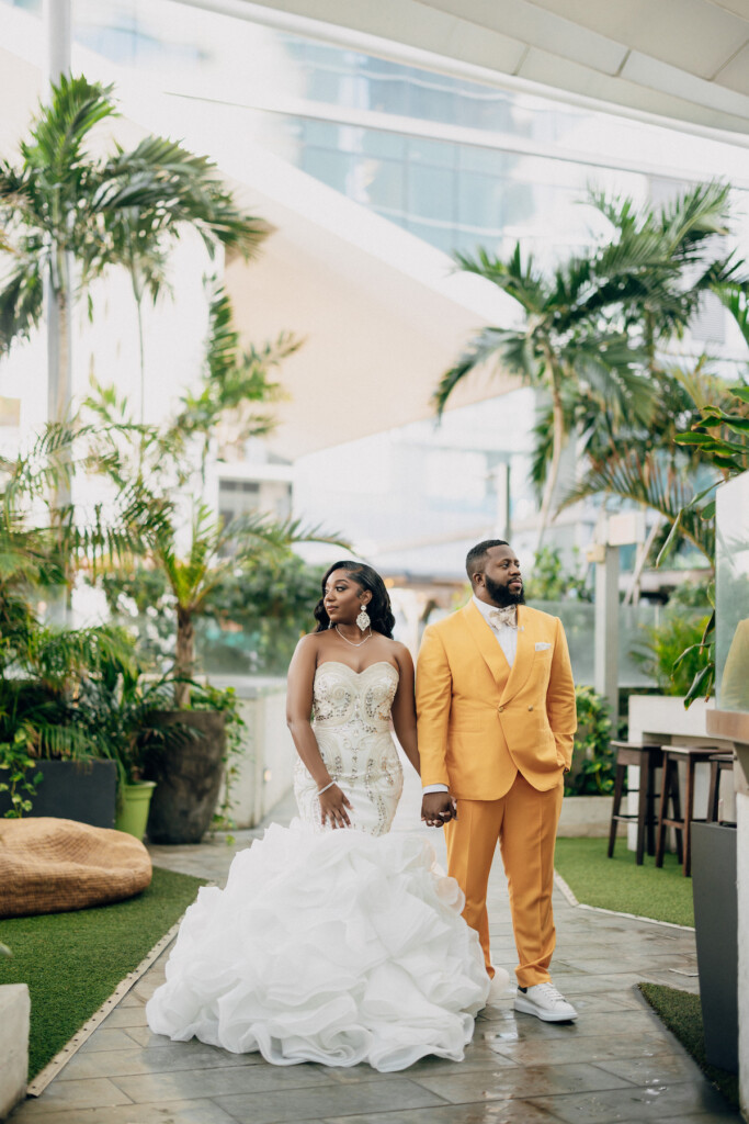 Featured in Issue 31, this modern Miami wedding captured by Muna Coterie member REEM Photography features green details and stylish attire.