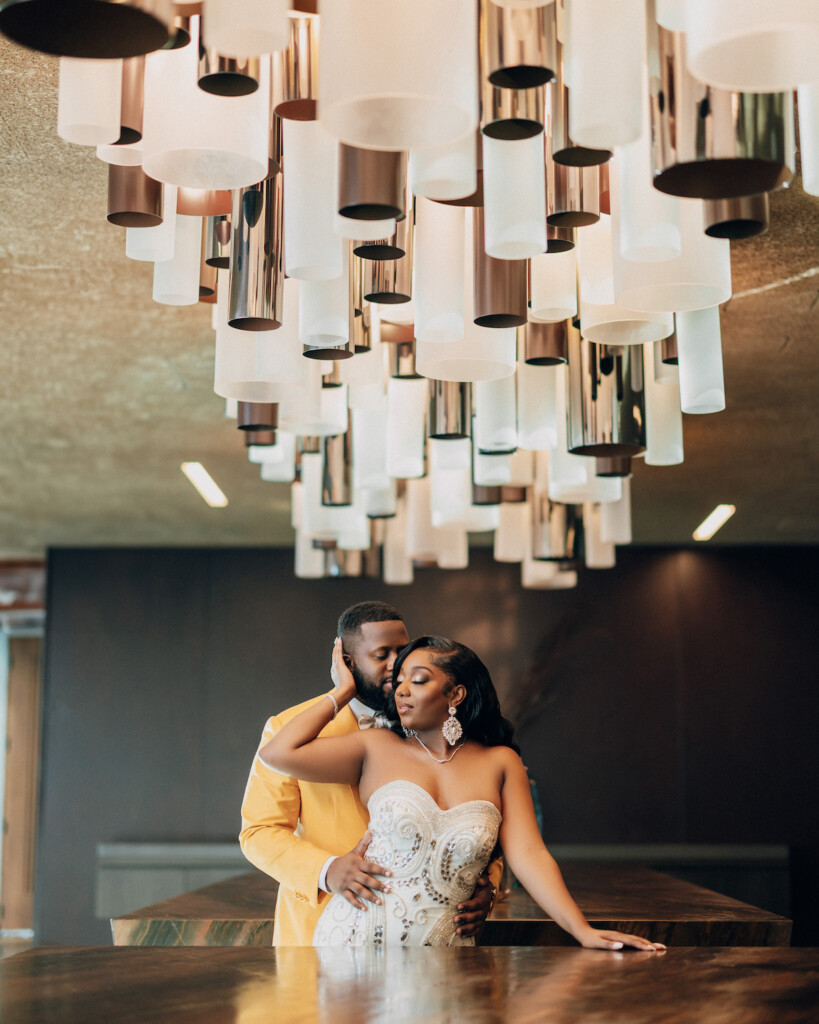 Featured in Issue 31, this modern Miami wedding captured by Muna Coterie member REEM Photography features green details and stylish attire.