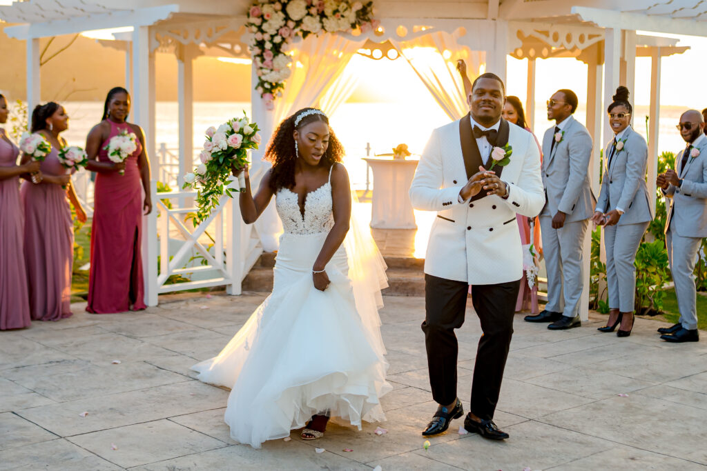 Tiffany and Andrew's big day featured an unforgettable beach wedding in Jamaica and a golden hour reception under the stars.