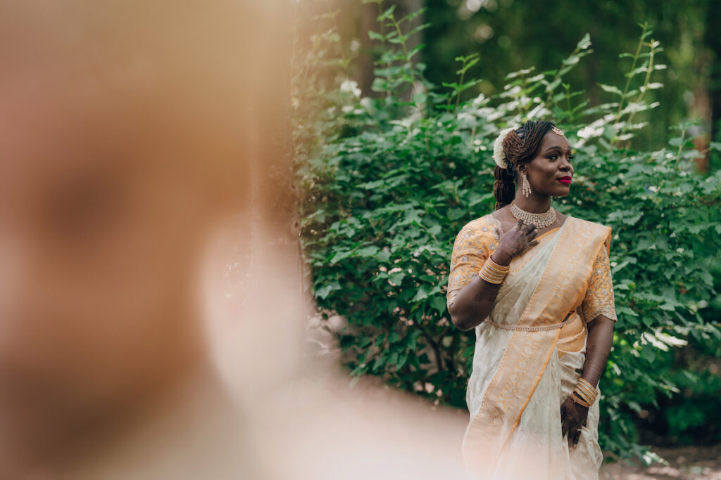 Bunmi and Kiran wed at their vibrant multicultural wedding which beautifully blended traditional Hindu and Nigerian wedding customs!