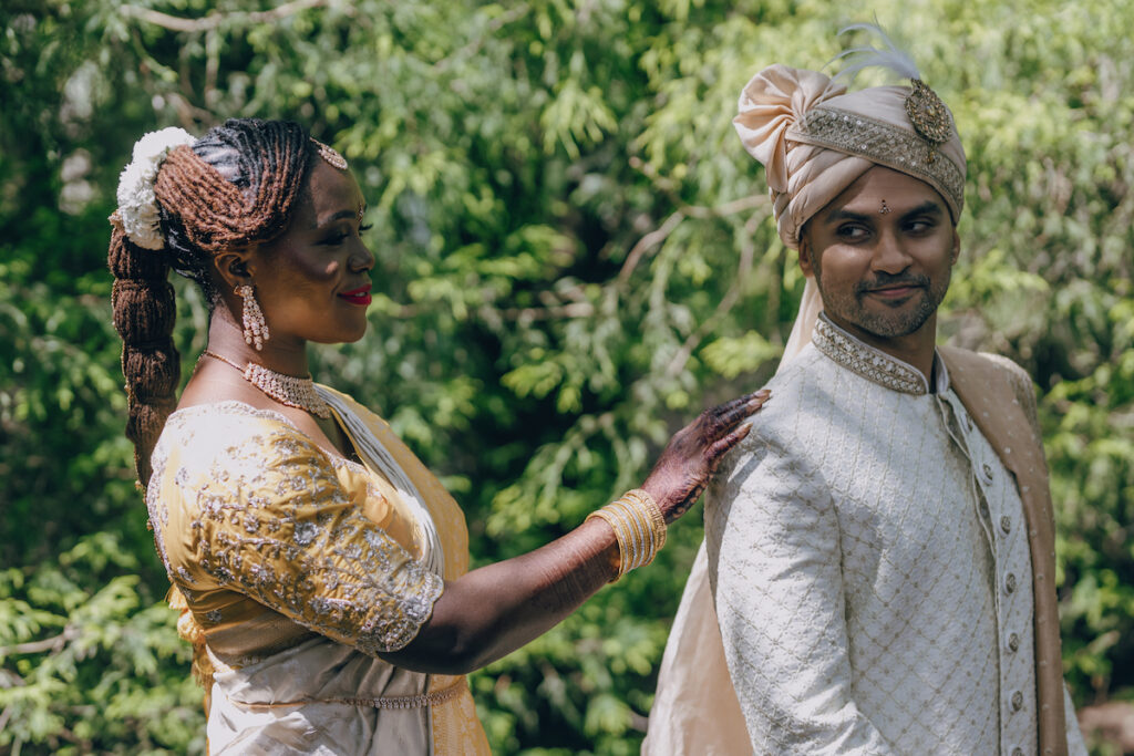 Bunmi and Kiran wed at their vibrant multicultural wedding which beautifully blended traditional Hindu and Nigerian wedding customs!