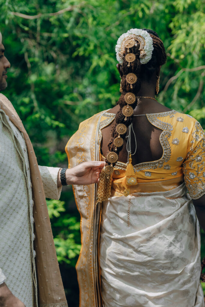 Bunmi and Kiran wed at their vibrant multicultural wedding which beautifully blended traditional Hindu and Nigerian wedding customs!