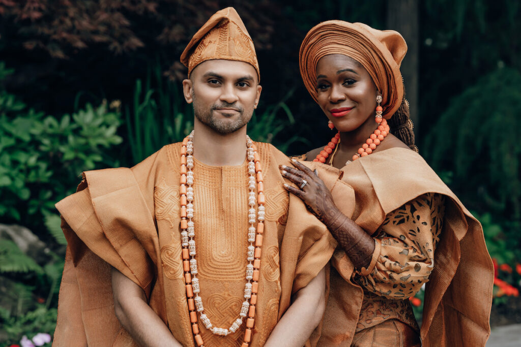 Bunmi and Kiran wed at their vibrant multicultural wedding which beautifully blended traditional Hindu and Nigerian wedding customs!