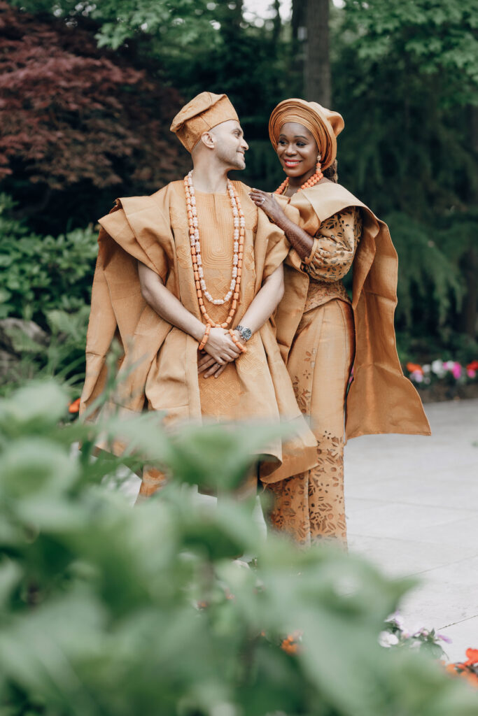 Bunmi and Kiran wed at their vibrant multicultural wedding which beautifully blended traditional Hindu and Nigerian wedding customs!