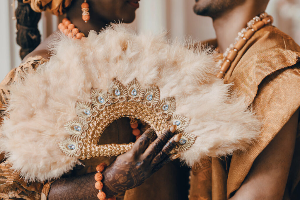 Bunmi and Kiran wed at their vibrant multicultural wedding which beautifully blended traditional Hindu and Nigerian wedding customs!