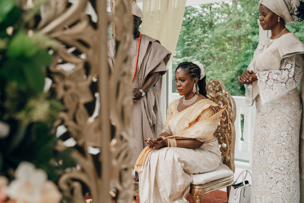 Bunmi and Kiran wed at their vibrant multicultural wedding which beautifully blended traditional Hindu and Nigerian wedding customs!