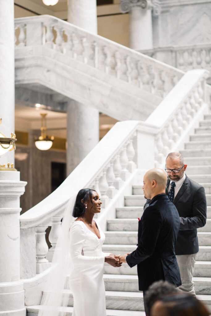 Ryan and Breanna's modern courthouse wedding had guests celebrating the stylish bride and groom on the salt flats of Utah.