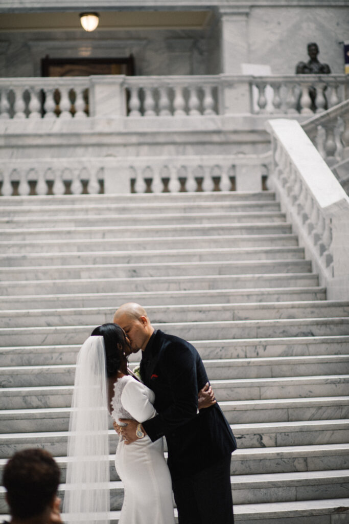 Ryan and Breanna's modern courthouse wedding had guests celebrating the stylish bride and groom on the salt flats of Utah.