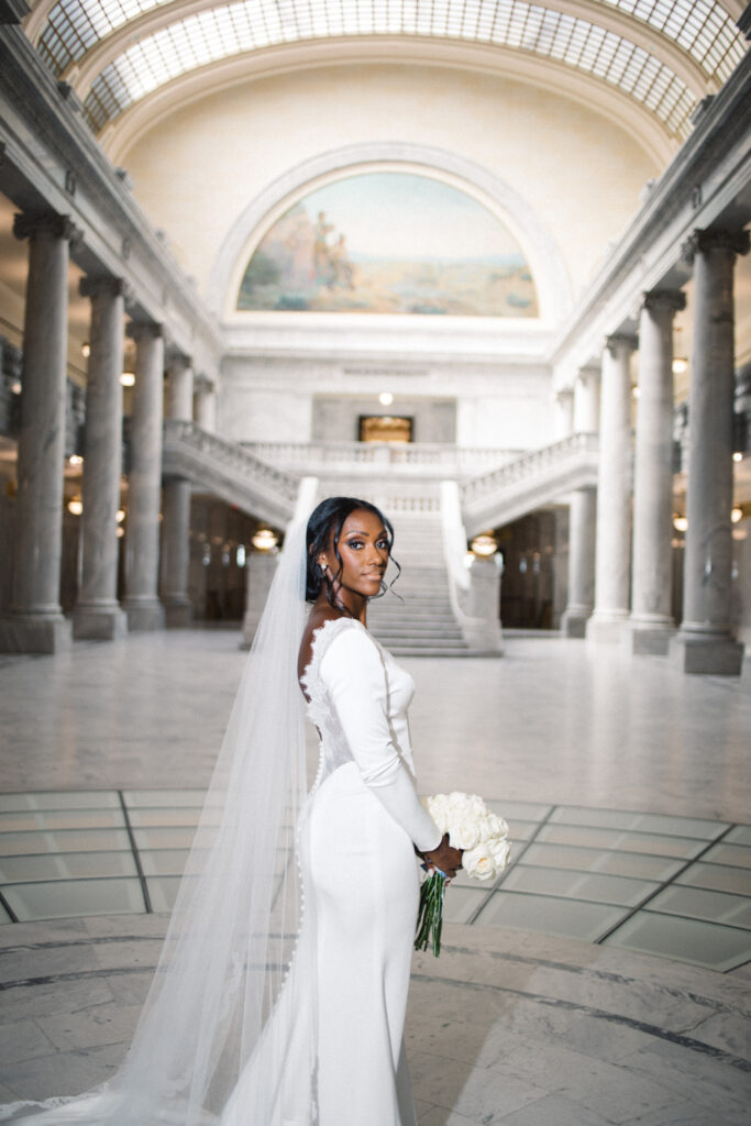 Ryan and Breanna's modern courthouse wedding had guests celebrating the stylish bride and groom on the salt flats of Utah.