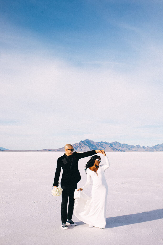 Ryan and Breanna's modern courthouse wedding had guests celebrating the stylish bride and groom on the salt flats of Utah.