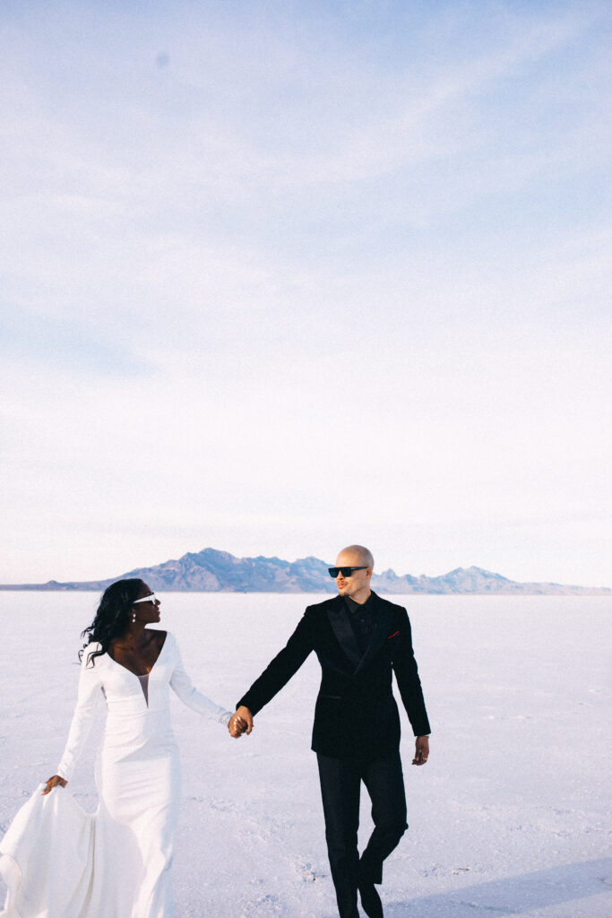 Ryan and Breanna's modern courthouse wedding had guests celebrating the stylish bride and groom on the salt flats of Utah.