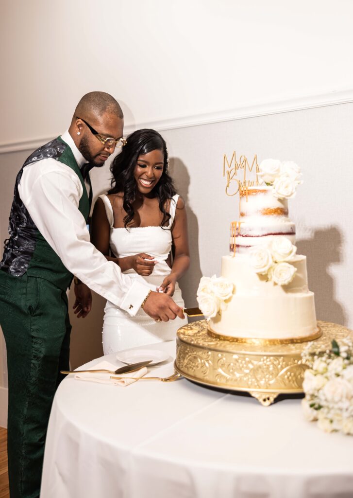 Rasmine and Tyrell's modern industrial wedding in South Carolina had luxe green and gold details and celebrated their southern heritage.