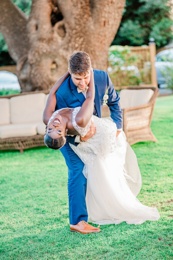 Brenda and Nolan's sunny outdoor estate wedding featured a cute something blue and a vintage phone booth built by the groom!