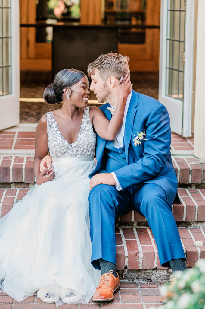 Brenda and Nolan's sunny outdoor estate wedding featured a cute something blue and a vintage phone booth built by the groom!