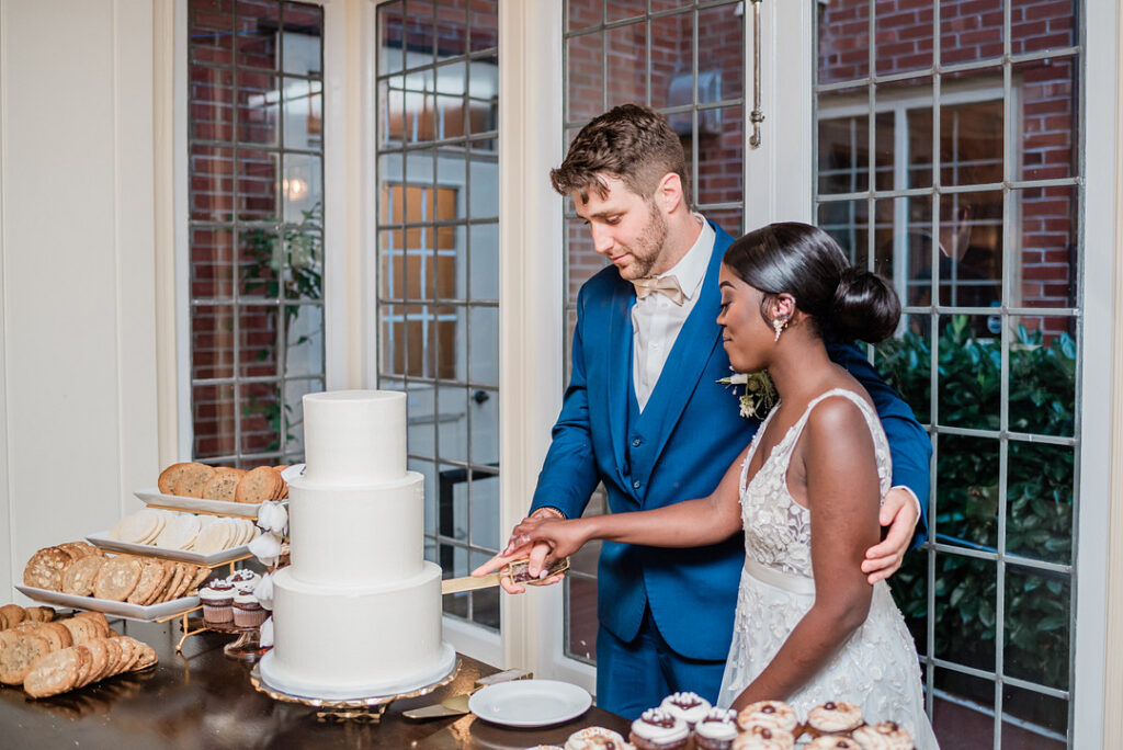 Brenda and Nolan's sunny outdoor estate wedding featured a cute something blue and a vintage phone booth built by the groom!