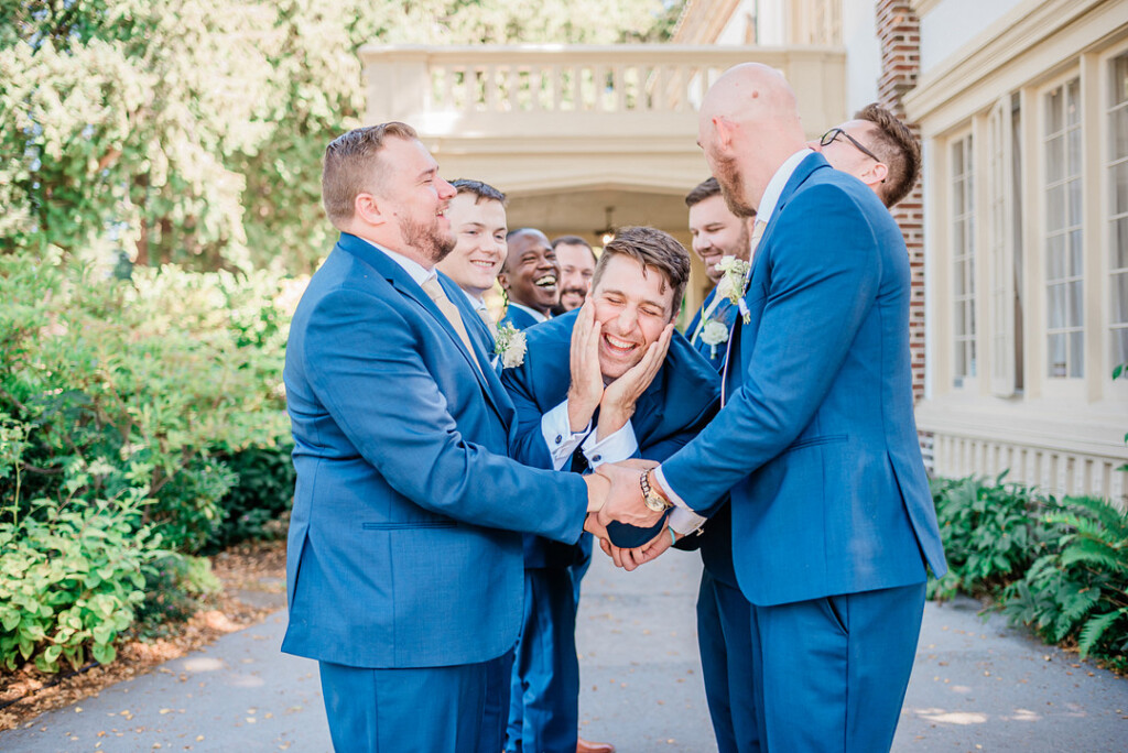 Brenda and Nolan's sunny outdoor estate wedding featured a cute something blue and a vintage phone booth built by the groom!