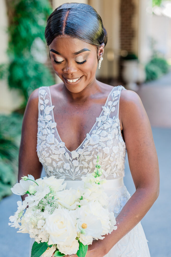 Brenda and Nolan's sunny outdoor estate wedding featured a cute something blue and a vintage phone booth built by the groom!