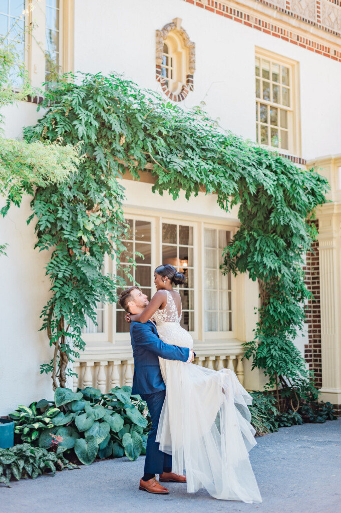 Brenda and Nolan's sunny outdoor estate wedding featured a cute something blue and a vintage phone booth built by the groom!