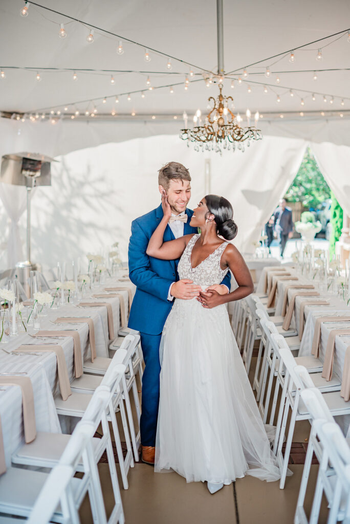 Brenda and Nolan's sunny outdoor estate wedding featured a cute something blue and a vintage phone booth built by the groom!