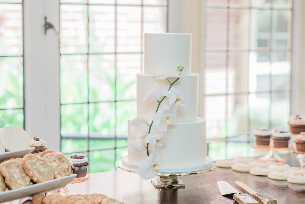 Brenda and Nolan's sunny outdoor estate wedding featured a cute something blue and a vintage phone booth built by the groom!