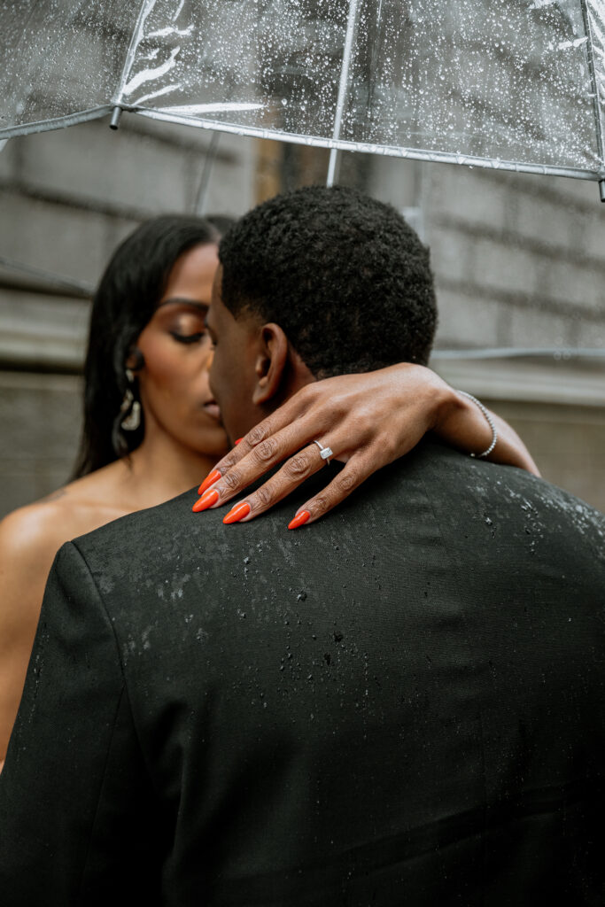 The rain didn't put a stop to Tanisha and Zachary's sexy and romantic outdoor engagement session set in downtown Atlanta.