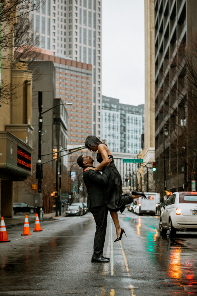 The rain didn't put a stop to Tanisha and Zachary's sexy and romantic outdoor engagement session set in downtown Atlanta.