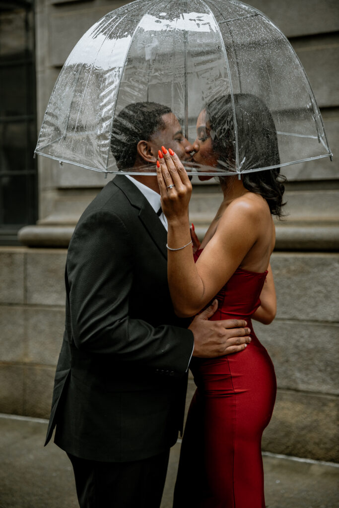 The rain didn't put a stop to Tanisha and Zachary's sexy and romantic outdoor engagement session set in downtown Atlanta.