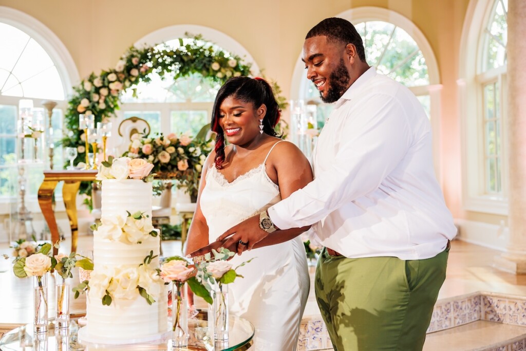 Shaniquia & Rashaad's summer vows at Morais Vineyards in Bealton, VA, featured a beautiful Portuguese-style vineyard with lush greenery.