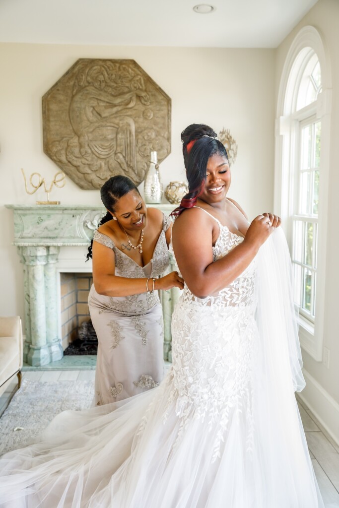 Shaniquia & Rashaad's summer vows at Morais Vineyards in Bealton, VA, featured a beautiful Portuguese-style vineyard with lush greenery.