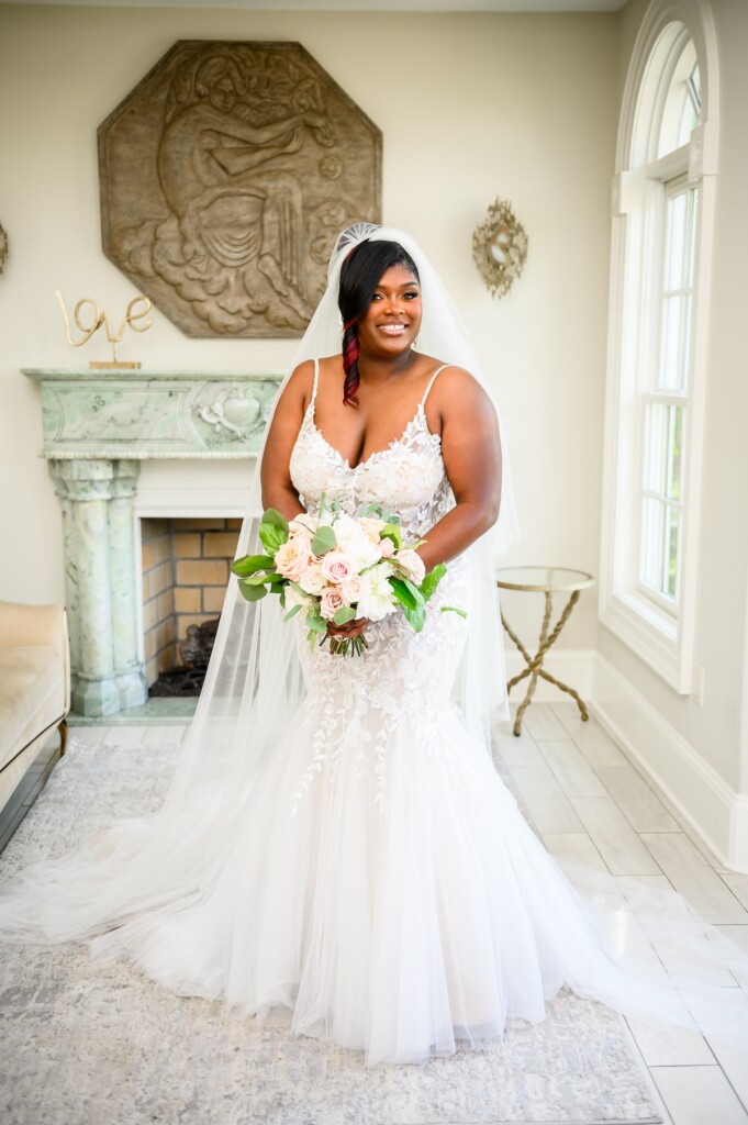 Shaniquia & Rashaad's summer vows at Morais Vineyards in Bealton, VA, featured a beautiful Portuguese-style vineyard with lush greenery.