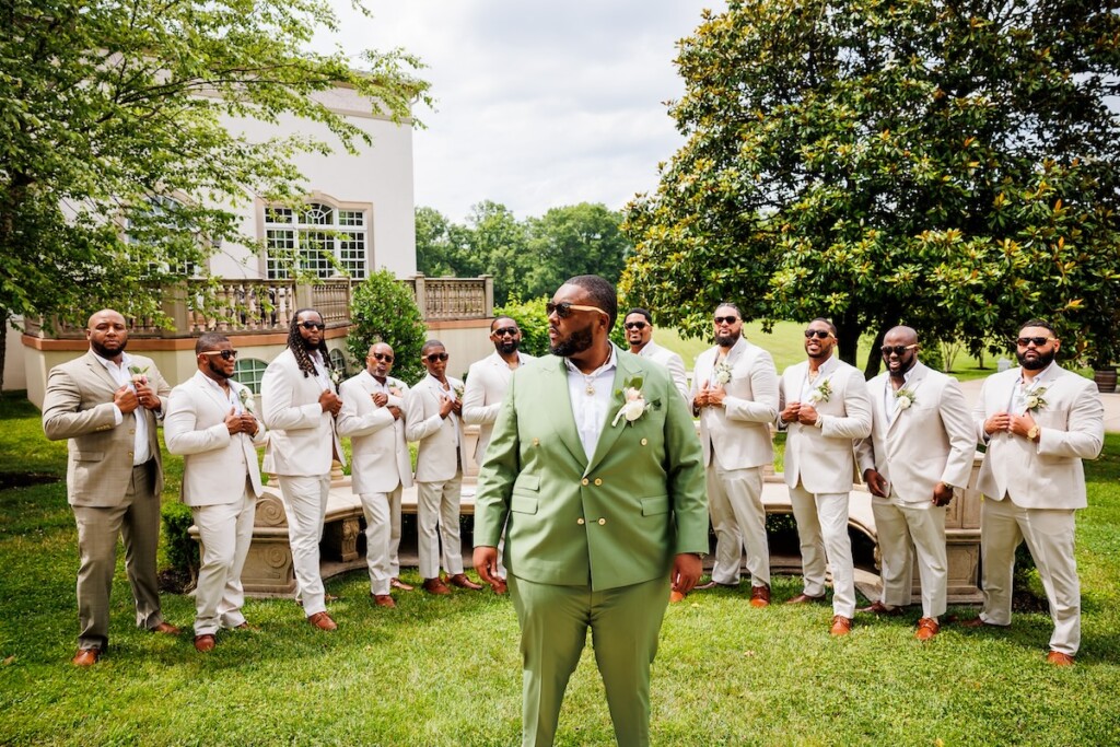 Shaniquia & Rashaad's summer vows at Morais Vineyards in Bealton, VA, featured a beautiful Portuguese-style vineyard with lush greenery.