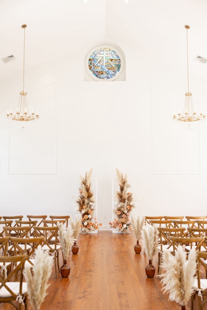 Rich fall hues of brown, auburn, and gold were seen throughout Ashley and Dee's intimate chapel wedding in Flora, Mississippi. 