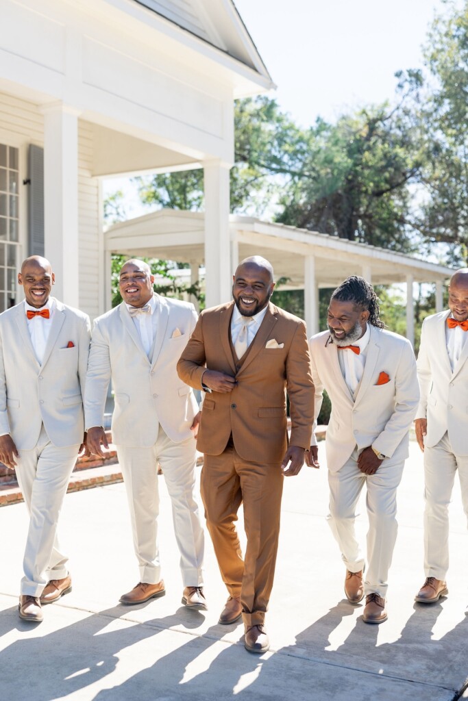 Rich fall hues of brown, auburn, and gold were seen throughout Ashley and Dee's intimate chapel wedding in Flora, Mississippi. 