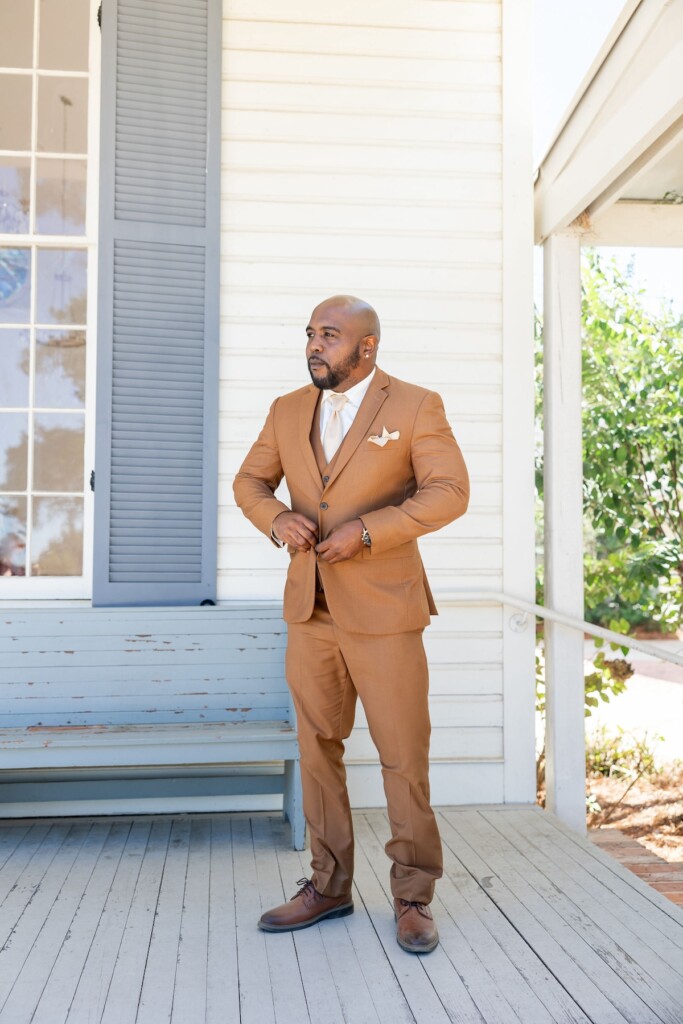 Rich fall hues of brown, auburn, and gold were seen throughout Ashley and Dee's intimate chapel wedding in Flora, Mississippi. 