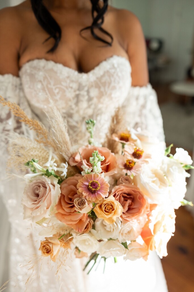 Rich fall hues of brown, auburn, and gold were seen throughout Ashley and Dee's intimate chapel wedding in Flora, Mississippi. 