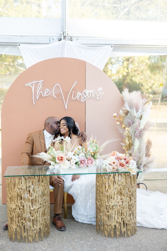 Rich fall hues of brown, auburn, and gold were seen throughout Ashley and Dee's intimate chapel wedding in Flora, Mississippi. 