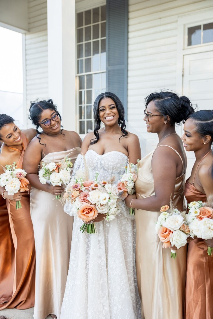 Rich fall hues of brown, auburn, and gold were seen throughout Ashley and Dee's intimate chapel wedding in Flora, Mississippi. 