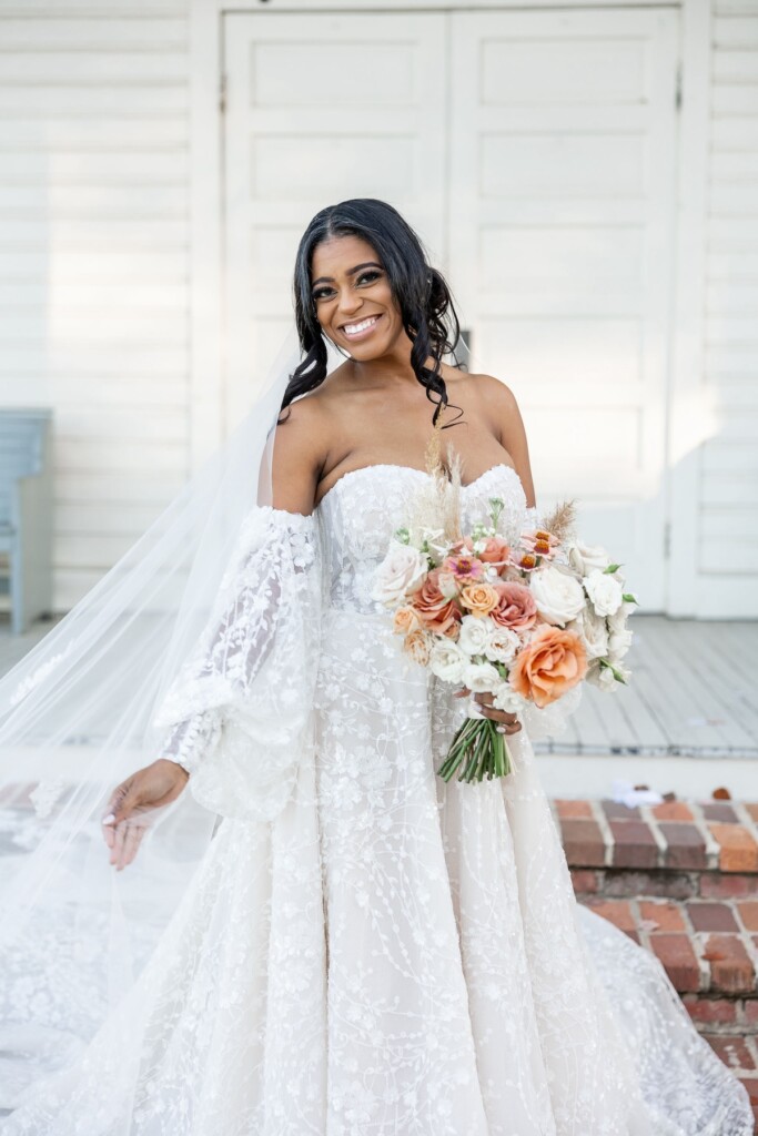 Rich fall hues of brown, auburn, and gold were seen throughout Ashley and Dee's intimate chapel wedding in Flora, Mississippi. 