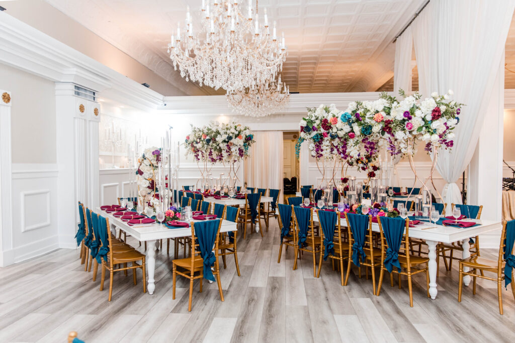 Vibrant jewel-toned colors and fun entertainment (including a caricaturist) made this ballroom wedding in South Carolina one of a kind.