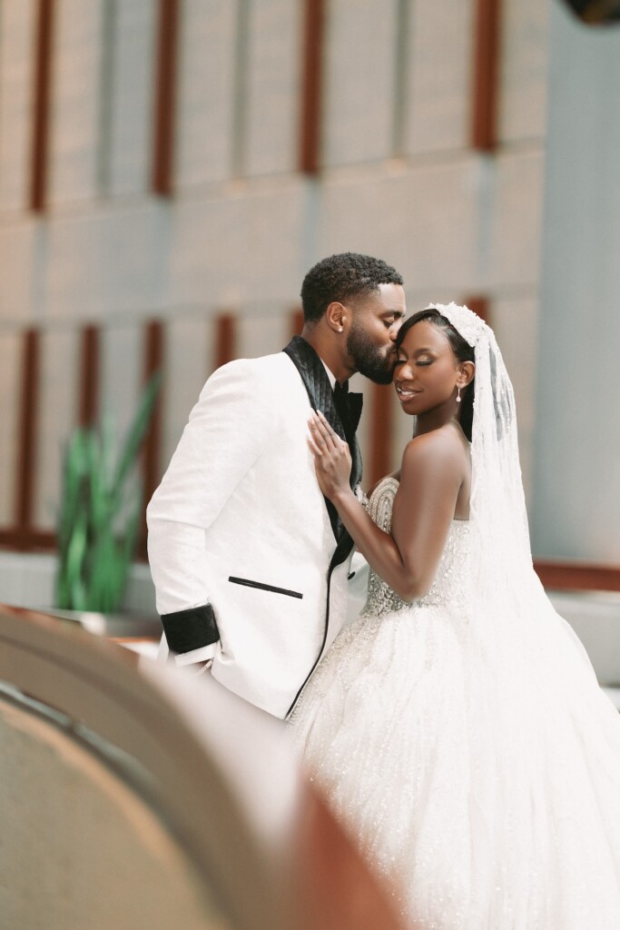 Jodi & Obi tied the knot in a romantic ballroom wedding in Atlanta, Georgia, with lush florals and traditions honoring their Nigerian culture.