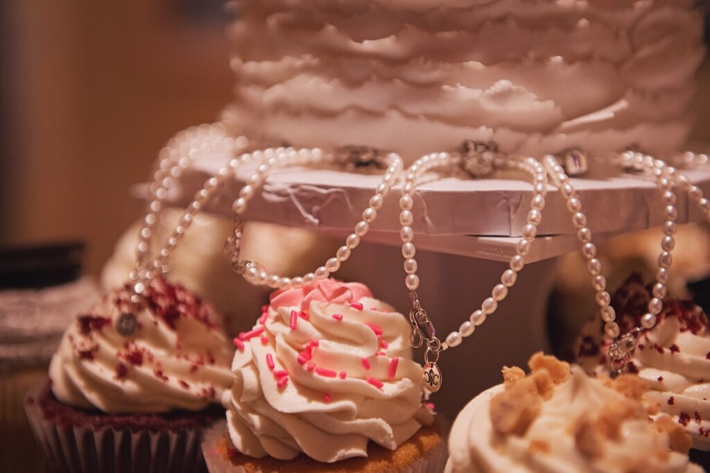 New Orleans-based company, Cristy Cali Jewelry, reimagines the vintage wedding tradition of the 'Cake Pull' with custom charm bracelets.