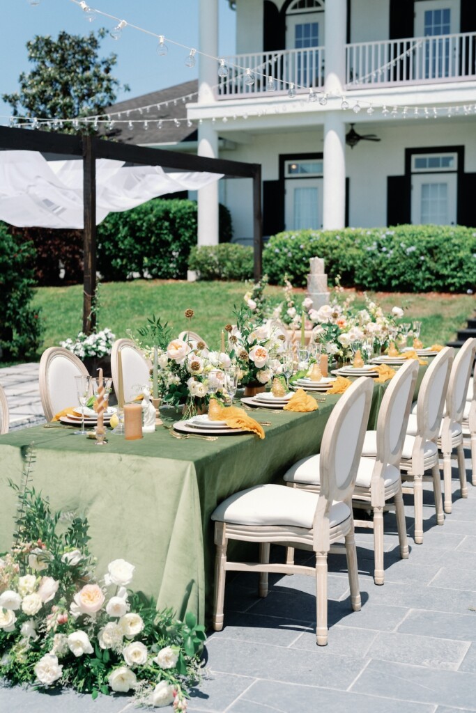 This playful sun-filled styled wedding shoot in Florida features gorgeous florals, pretty pearls, and royal honey hues.