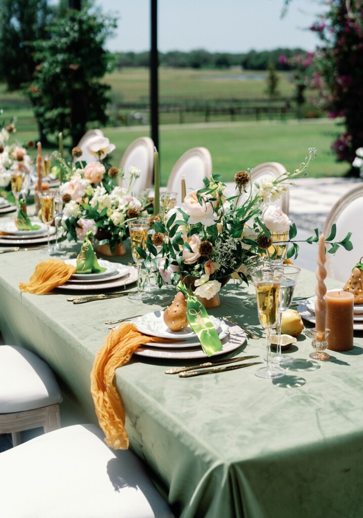 This playful sun-filled styled wedding shoot in Florida features gorgeous florals, pretty pearls, and royal honey hues.