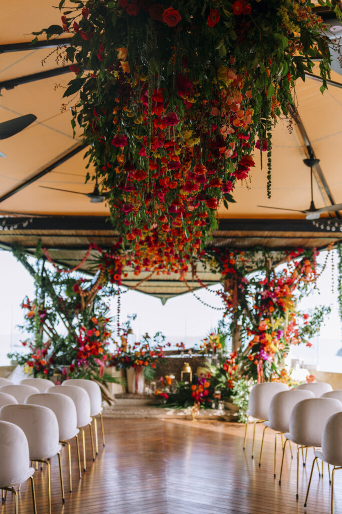 Opulent tropical florals mixed with a beautiful ocean-side estate made this destination wedding in Costa Rica a dream come true!