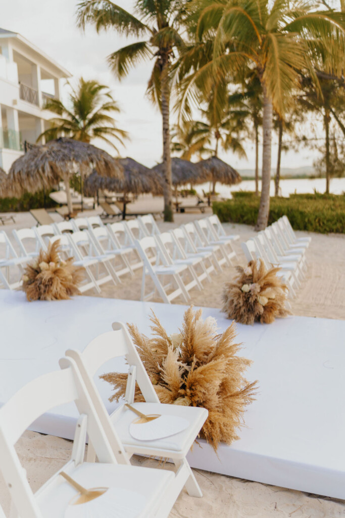 Bohemian glam destination wedding at Excellence Oyster Bay, Jamaica, was filled with heartfelt moments and beautiful Caribbean backdrops.