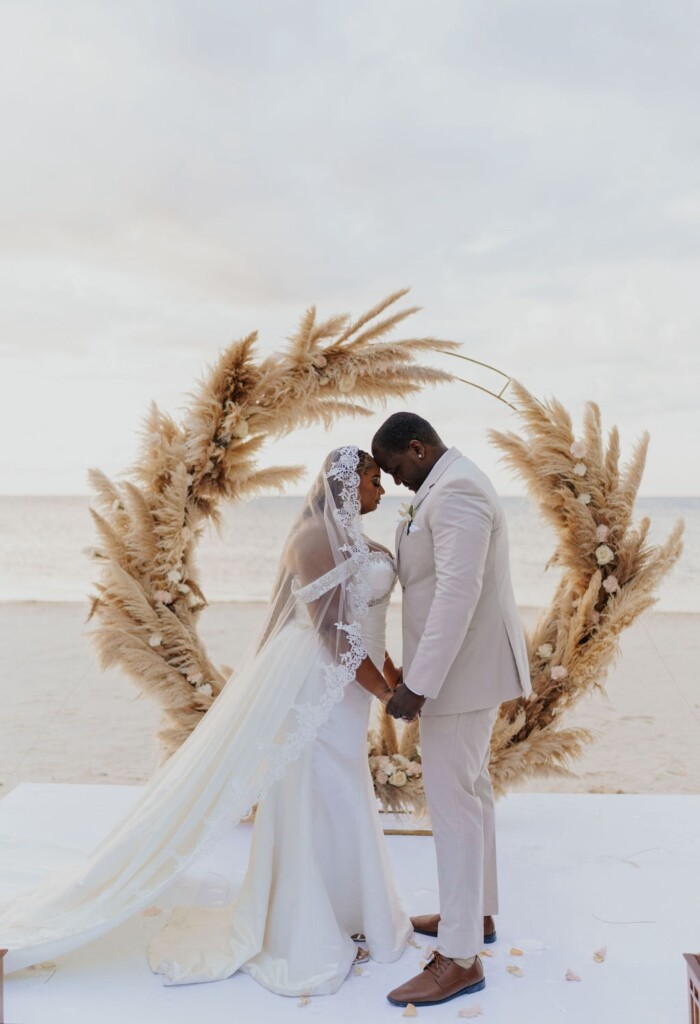 Bohemian glam destination wedding at Excellence Oyster Bay, Jamaica, was filled with heartfelt moments and beautiful Caribbean backdrops.