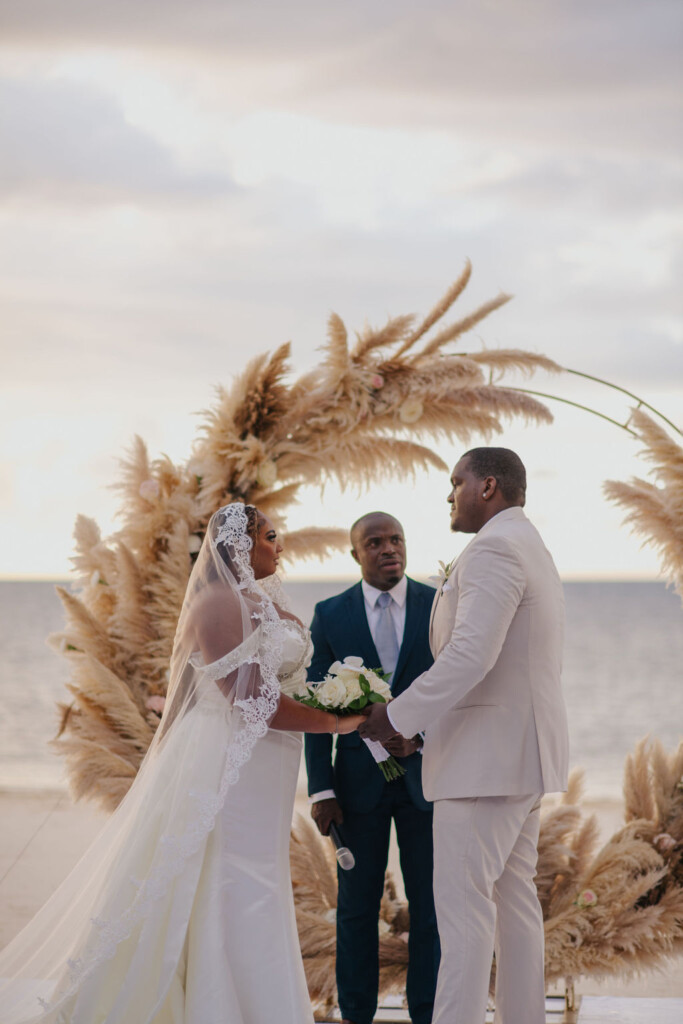 Bohemian glam destination wedding at Excellence Oyster Bay, Jamaica, was filled with heartfelt moments and beautiful Caribbean backdrops.