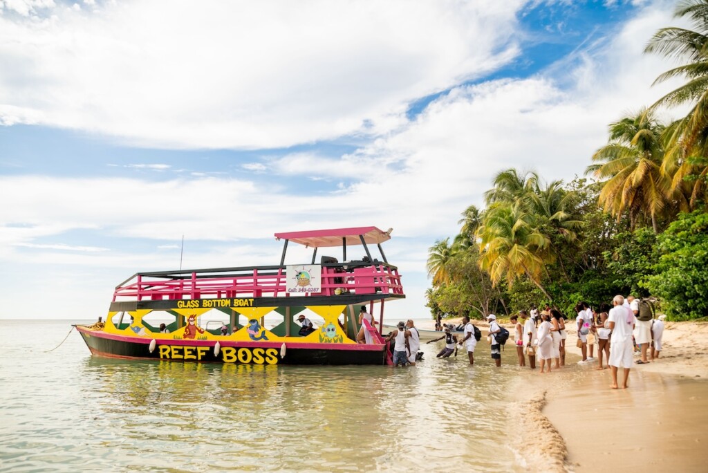 Kerron Duncan and Dr. Malika Grayson tied the knot in a beautiful destination wedding at Pigeon Point Heritage Park, Tobago.